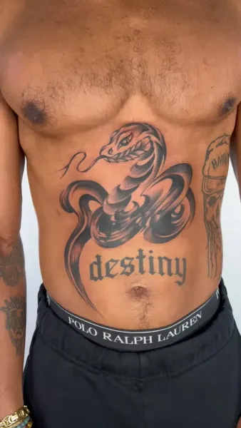 Bespoke Black & Grey Snake and Script Stomach Tattoo | Daisuke Sakaguchi