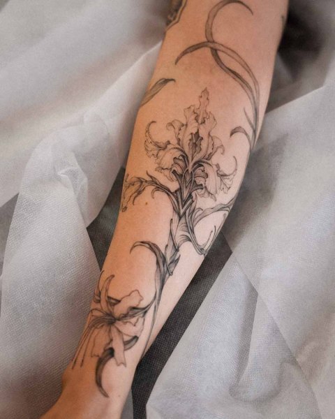 Fine line iris tattoo by Dominika at Silent Moon, our private tattoo studio in Bermondsey, South East London.