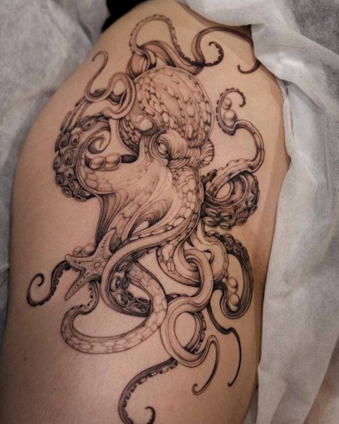 Fine line octopus tattoo by Dominika at Silent Moon, our private tattoo studio in Bermondsey, South East London.