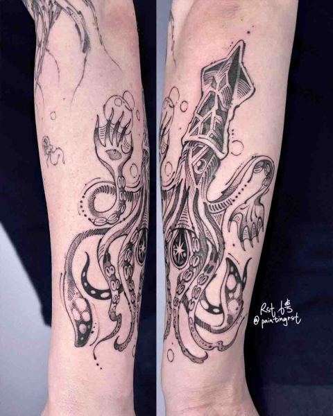 Blackwork squid forearm tattoo by guest artist Peng at Silent Moon, our private tattoo studio in Bermondsey, South East London.