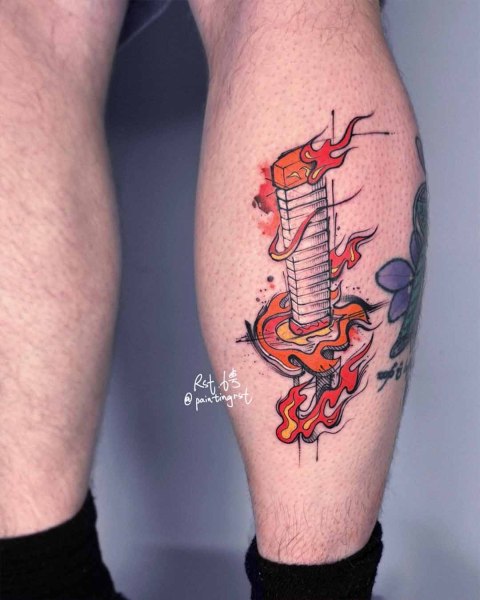Colour flaming katana tattoo by guest artist Peng at Silent Moon, our private tattoo studio in Bermondsey, South East London.