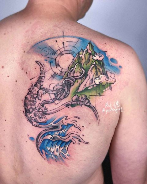 Colour mountain and wave shoulder blade tattoo by guest artist Peng at Silent Moon, our private tattoo studio in Bermondsey, South East London.