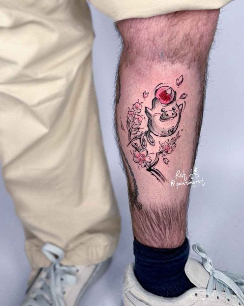 Pokémon and cherry blossom calf tattoo by guest artist Peng at Silent Moon, our private tattoo studio in Bermondsey, South East London.