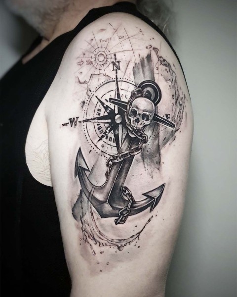 Black and grey realism anchor and compass tattoo by Klaudia at Silent Moon, our private tattoo studio in Bermondsey, South East London.