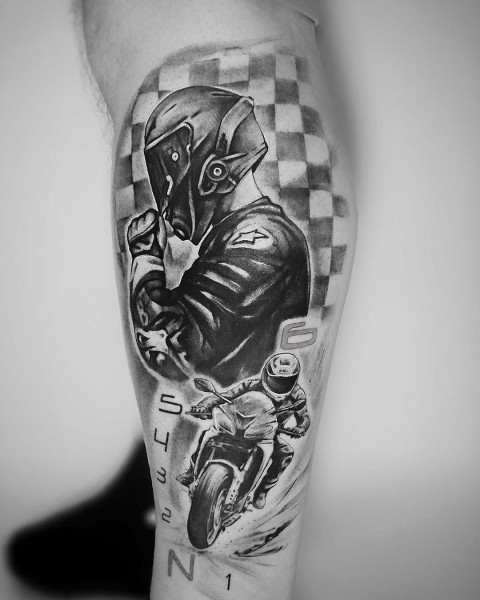 Black and grey realism motorcycle racing tattoo by Klaudia at Silent Moon, our private tattoo studio in Bermondsey, South East London.