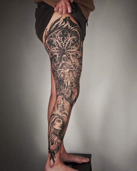 Black and grey realism religious full leg sleeve by Klaudia at Silent Moon, our private tattoo studio in Bermondsey, South East London.