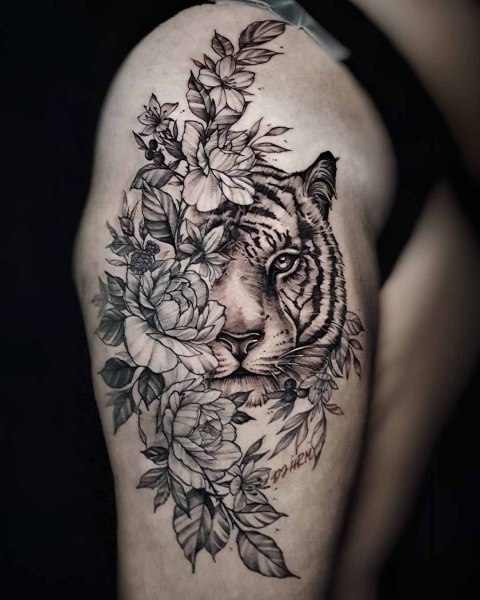 Black and grey realism tiger and peony tattoo by Klaudia at Silent Moon, our private tattoo studio in Bermondsey, South East London.