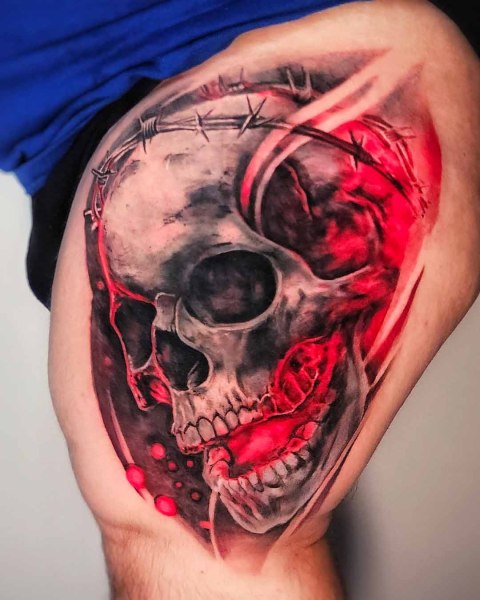 Realism skull tattoo with red accents by Klaudia at Silent Moon, our private tattoo studio in Bermondsey, South East London.