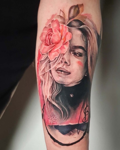 Realism woman portrait tattoo with a watercolour rose by Klaudia at Silent Moon, our private tattoo studio in Bermondsey, South East London.