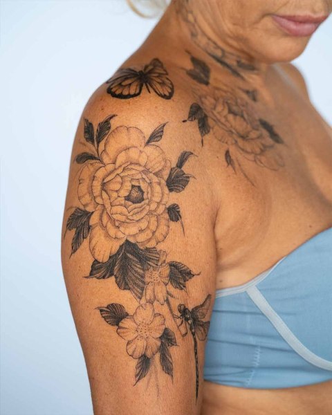 Fine line peony shoulder tattoo by Robin at Silent Moon, our private tattoo studio in Bermondsey, South East London.