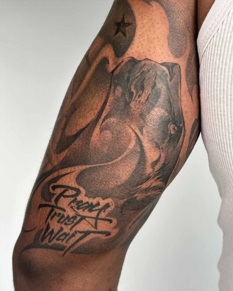Black and grey praying hands tattoo by Satrxx at Silent Moon, our private tattoo studio in Bermondsey, South East London.