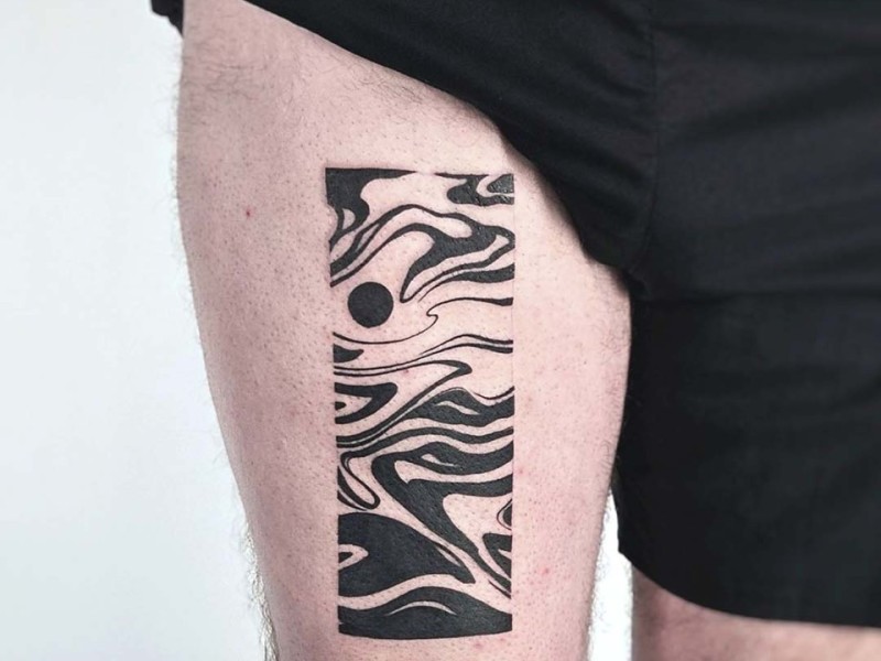 Abstract blackwork liquid waves tattoo on the thigh by Klaudia at Silent Moon, our private tattoo studio in Bermondsey, South East London.