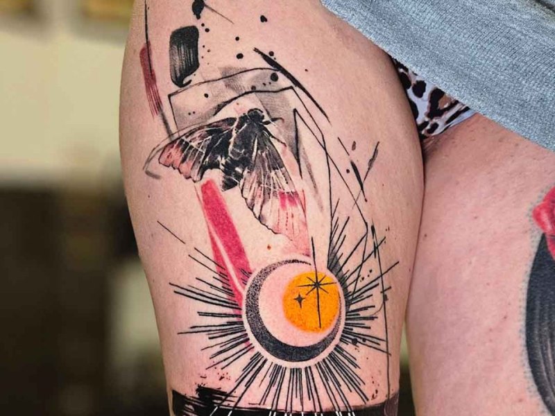 Abstract moth and crescent moon tattoo by Klaudia at Silent Moon, our private tattoo studio in Bermondsey, South East London.