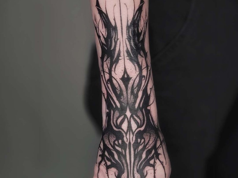 Neo-tribal blackwork tattoo from forearm to hand by Klaudia at Silent Moon, our private tattoo studio in Bermondsey, South East London.