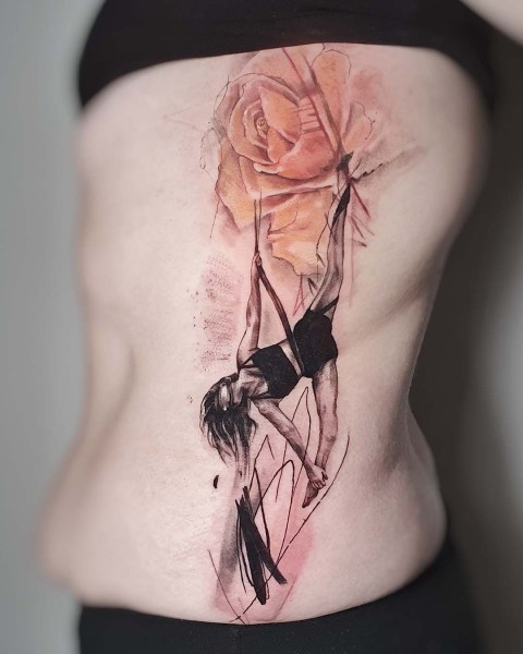 Watercolour aerial dancer and rose tattoo by Klaudia at Silent Moon, our private tattoo studio in Bermondsey, South East London.