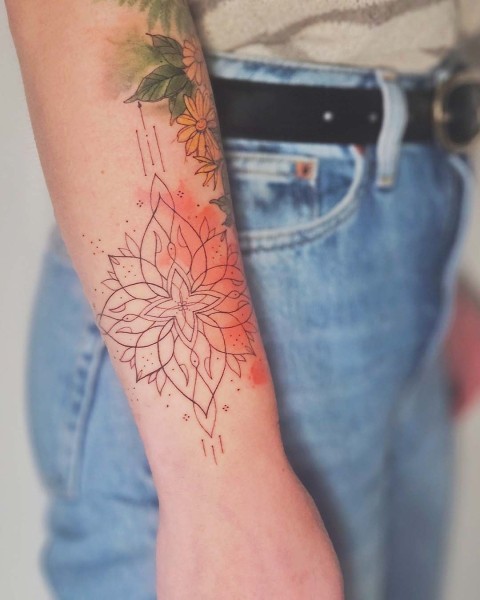 Fine line mandala tattoo with an orange watercolour wash by Klaudia at Silent Moon, our private tattoo studio in Bermondsey, South East London.