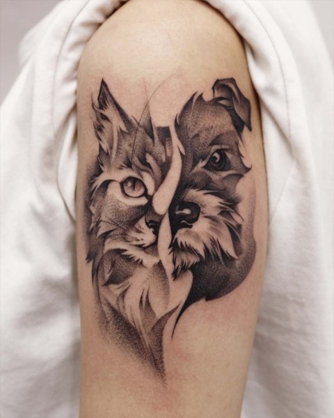 Black and grey cat and dog pet portrait tattoo by Satrxx at Silent Moon, our private tattoo studio in Bermondsey, South East London.