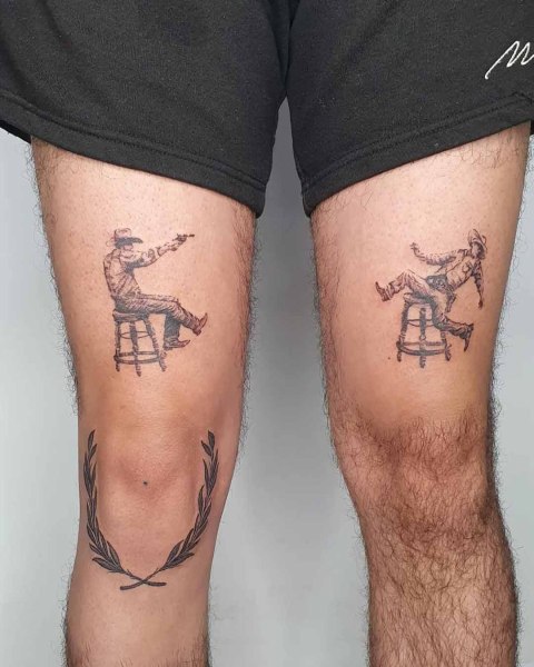 Fine line cowboy duel leg tattoos by Robin at Silent Moon, our private tattoo studio in Bermondsey, South East London.