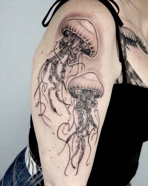 Fine line jellyfish tattoo by Robin at Silent Moon, our private tattoo studio in Bermondsey, South East London.