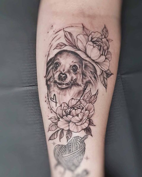 Fine line dog portrait tattoo with peonies by Klaudia at Silent Moon, our private tattoo studio in Bermondsey, South East London.