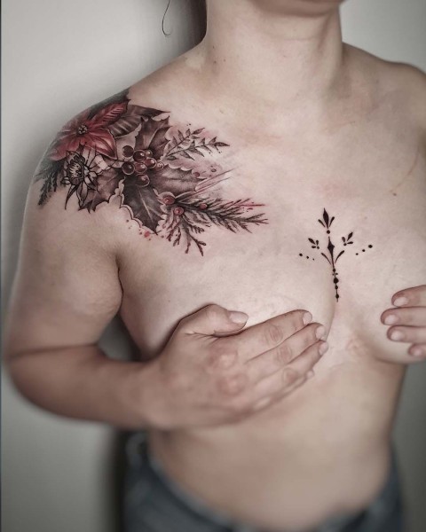 Winter botanical poinsettia and holly tattoo by Klaudia at Silent Moon, our private tattoo studio in Bermondsey, South East London.