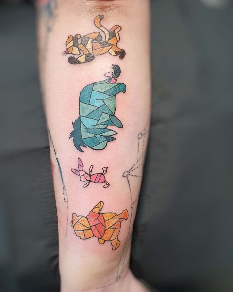 Geometric stained-glass cartoon animal tattoo by Klaudia at Silent Moon, our private tattoo studio in Bermondsey, South East London.
