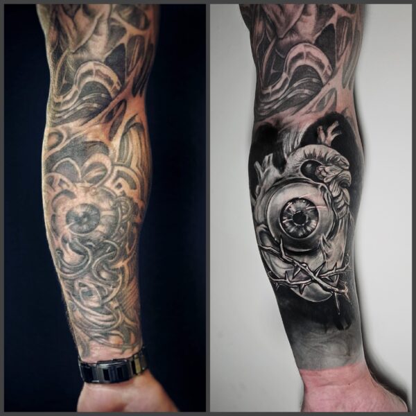 Before and After: Black and grey realism anatomical heart tattoo with a detailed eye and barbed wire, successfully covering a dark, abstract arm sleeve. Custom cover-up tattooed at Silent Moon Tattoo Studio London UK.