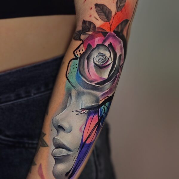 Colour Realism Portrait Tattoo with Rose and Abstract Elements | Silent Moon Tattoo Studio London Colour realism tattoo of woman’s face with rose and abstract design by tattoo artist at Silent Moon Tattoo Studio in London