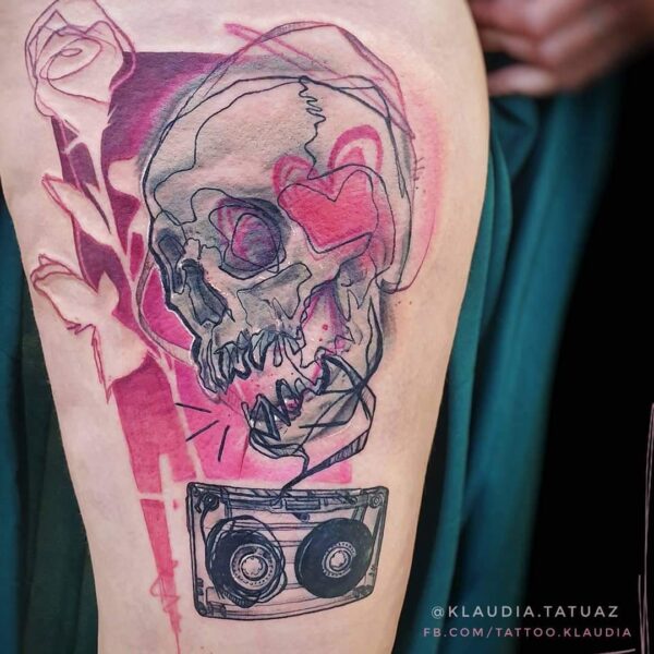 Abstract Skull & Cassette Tape Tattoo | Pink Watercolor & Sketch Art | Silent Moon London Abstract blackwork skull tattoo with a retro cassette tape and vibrant pink watercolor splashes. Sketch style custom art tattooed at Silent Moon Tattoo Studio London UK.