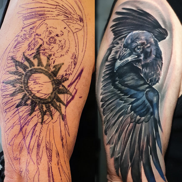 Realism Raven Tattoo | Black and Grey Bird Sleeve | Silent Moon Tattoo Studio London Black and grey realism raven tattoo on upper arm with subtle blue hues. Custom bird design tattooed at Silent Moon Tattoo Studio London UK