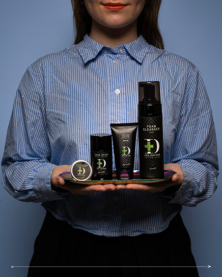 London tattoo artist Lubava presenting the Ink Doctor tattoo aftercare range, including foam cleanser and tattoo lotion, at Silent Moon Tattoo.