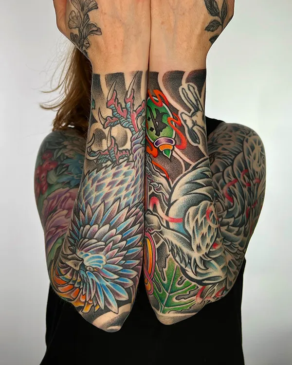 Japanese koi and wave sleeve tattoo — Silent Moon, Bermondsey London